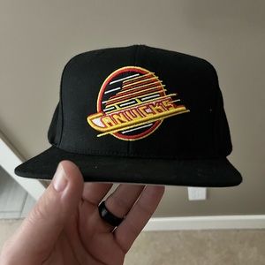 Vintage Mitchell and Ness Vancouver Canucks hat.